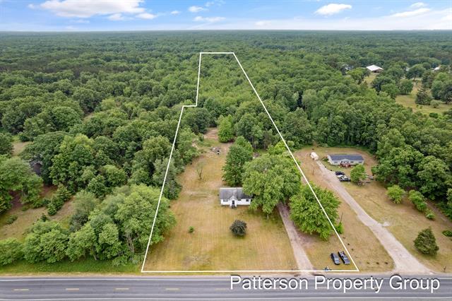 front view picture of 6825 Heights Ravenna Road, Fruitport, MI. 49415