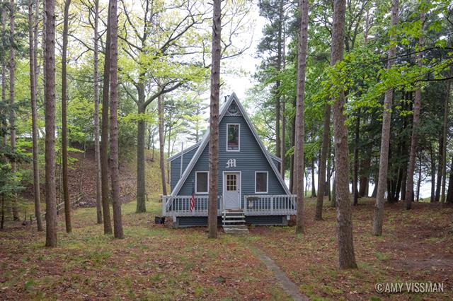 front view picture of 10807 Old Freesoil Road, Manistee, MI. 49660