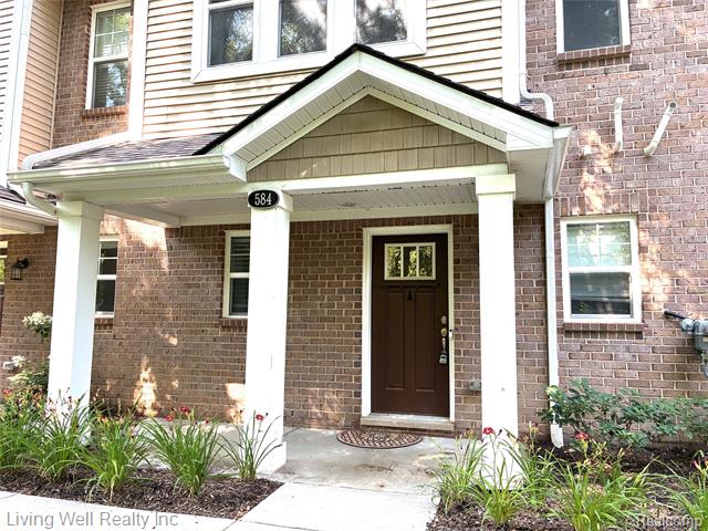 front view picture of 584 Anne Avenue, Brighton, MI. 48116