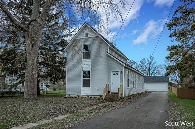front view picture of 152 S Pleasant Avenue, Lowell, MI. 49331