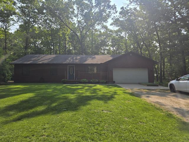 front view picture of 6560 Blue Lake Road, Twin Lake, MI. 49457