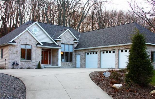 front view picture of 6607 Timber Cove Drive, West Olive, MI. 49460