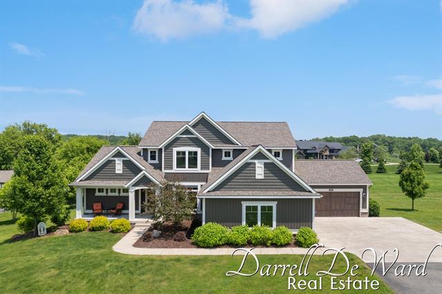 front view picture of 3940 Egypt Valley Avenue, Ada, MI. 49301