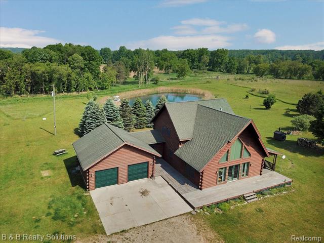 front view picture of 10071 N Hillman Road, Lakeview, MI. 48850