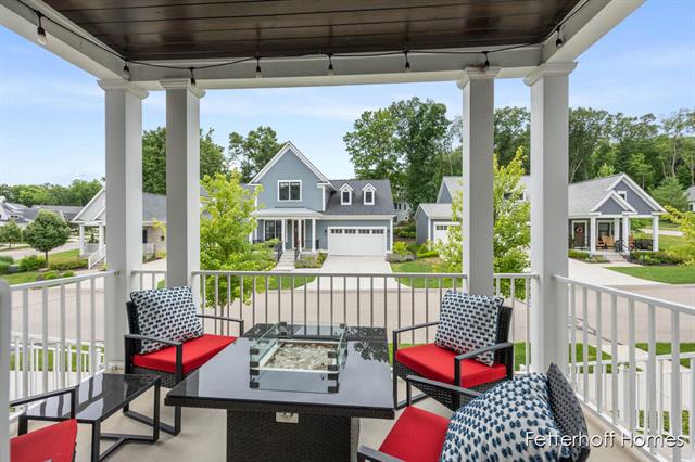 front view picture of 645 Greenslatese  Drive, Ada, MI. 49301