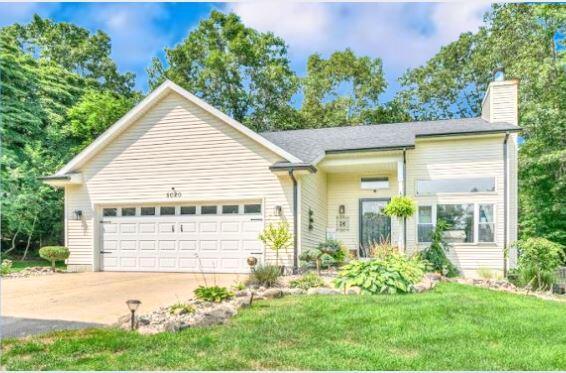 front view picture of 5020 Roundtree Drive, Middleville, MI. 49333