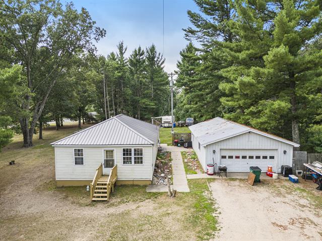 front view picture of 6811 Ryerson Road, Twin Lake, MI. 49457