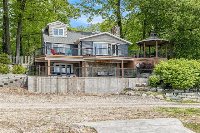 front view picture of 261 Midway Walk, Six Lakes, MI. 48886