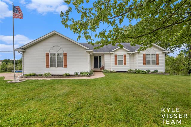 front view picture of 9020 5 Milene  Road, Ada, MI. 49301