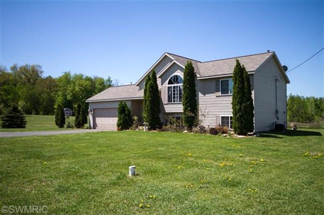 front view picture of 9355 Youngne  Avenue, Rockford, MI. 49341