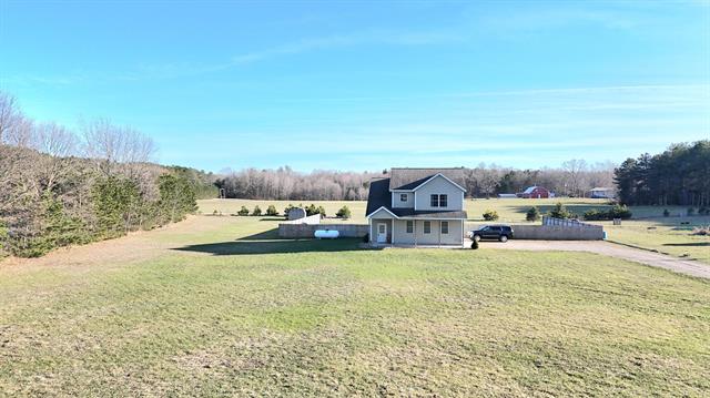 front view picture of 6039 W Morris Lake Road, Mears, MI. 49436