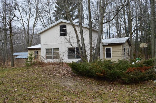 front view picture of 11721 State Road, Nunica, MI. 49448