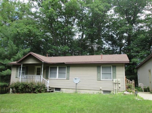 front view picture of 5604 N Mac Road, Irons, MI. 49644