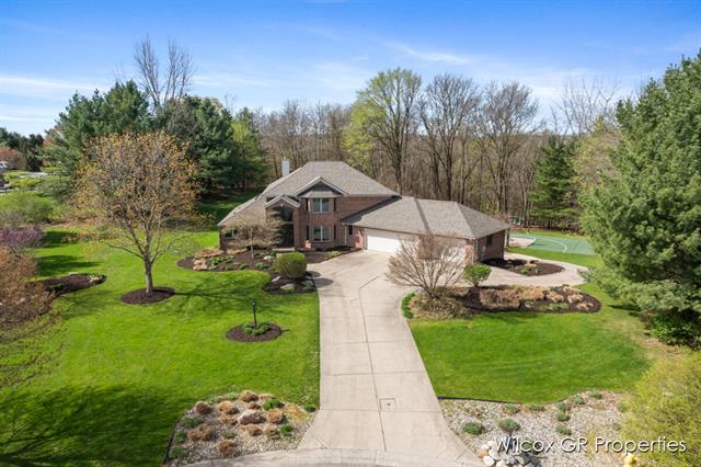 front view picture of 5401 Grand Valleyne  Court, Ada, MI. 49301
