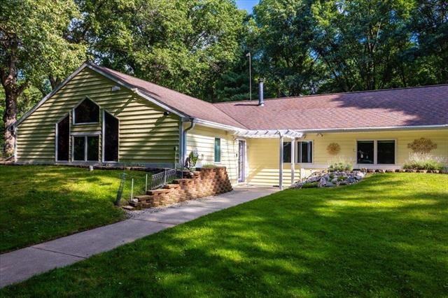 front view picture of 3900 Dursumne  Avenue, Ada, MI. 49301