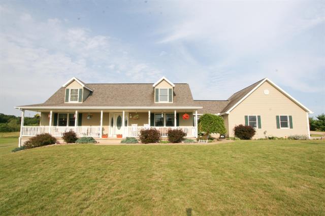 front view picture of 61651 County Line Road, Three Rivers, MI. 49093