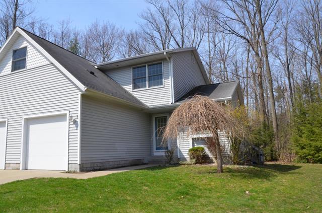 front view picture of 15145 Wintergreen Court, Spring Lake, MI. 49456