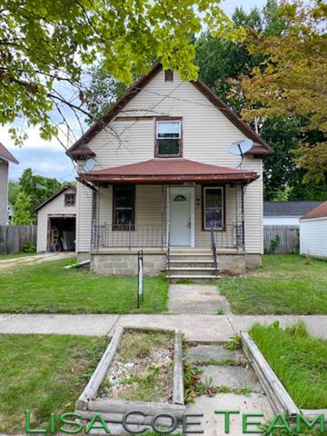 front view picture of 338 E Adams Street, Ionia, MI. 48846