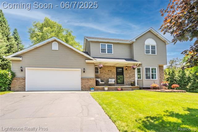 front view picture of 6713 Cheddar Valley Drive, Brighton, MI. 48116