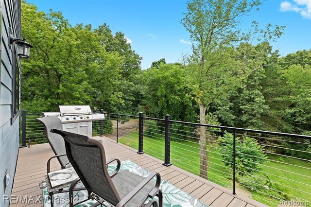 front view picture of 295 Whispering Pines, Milford, MI. 48380