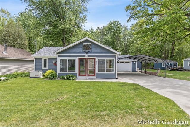 front view picture of 621 Eagle Point, Lake Odessa, MI. 48849