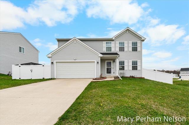 front view picture of 722 Misty Ridge Drive, Middleville, MI. 49333