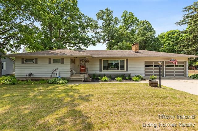 front view picture of 11737 W Carson City Road, Greenville, MI. 48838