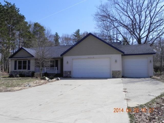 front view picture of 18440 Iroquois Drive, Spring Lake, MI. 49456
