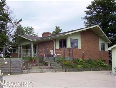 front view picture of 9772 Cheyenne Trail, Evart, MI. 49631