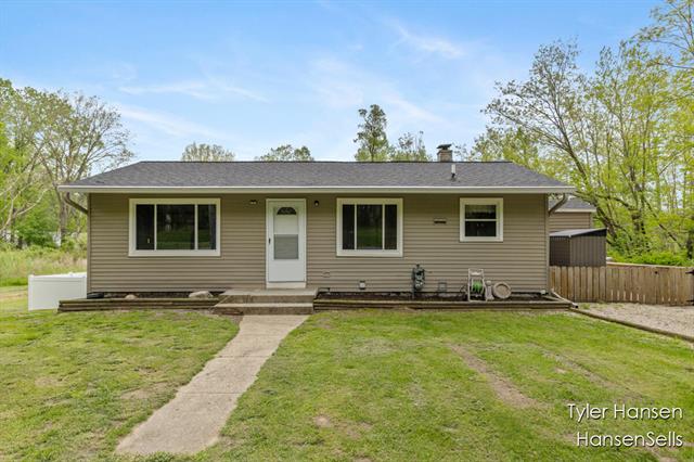 front view picture of 6410 Northlandne  Drive, Rockford, MI. 49341