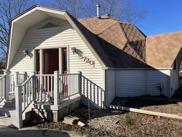 front view picture of 5720 Brooklyn Road, Jackson, MI. 49201