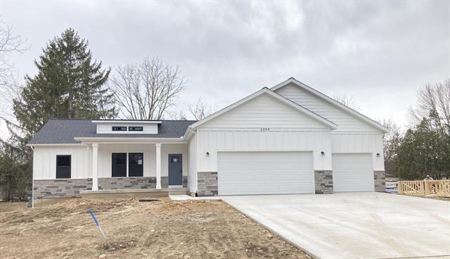 front view picture of 6069 Coventry Woodsne  Drive, Belmont, MI. 49306