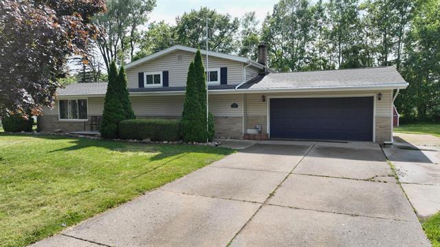 front view picture of 11427 Colonial Woods, Clio, MI. 48420