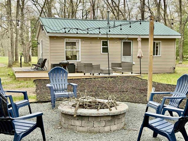 front view picture of 10856 Pine Creek Road, Manistee, MI. 49660