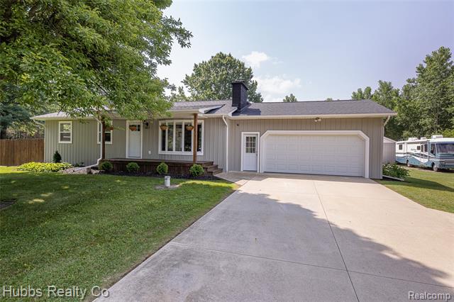 front view picture of 9373 Birch Run Road, Millington, MI. 48746