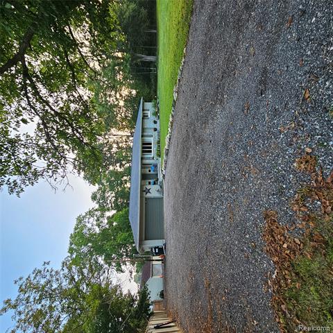 front view picture of 4430 Emmons Road, Howell, MI. 48855