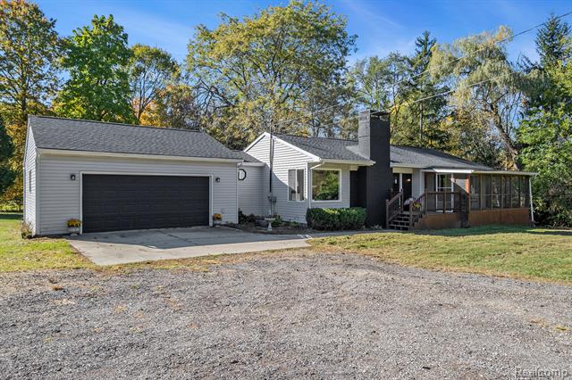 front view picture of 7481 Frances Road, Flushing, MI. 48433