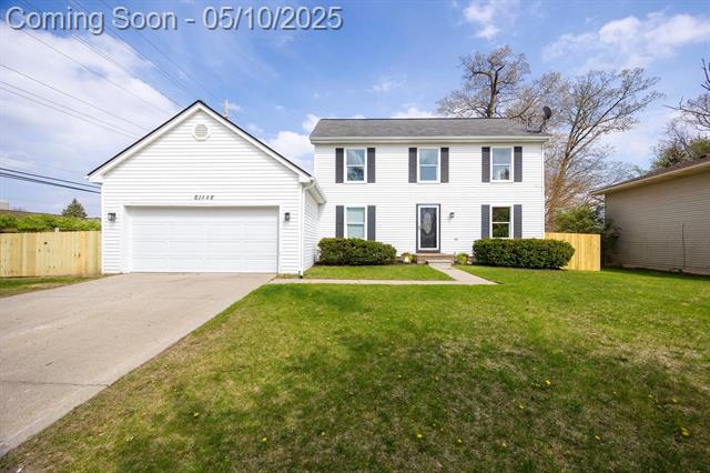 front view picture of 61448 Dean Dr, South Lyon, MI. 48178