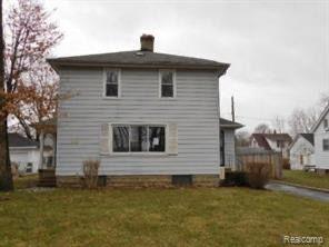 front view picture of 1413 Greenway Avenue, Flint, MI. 48504