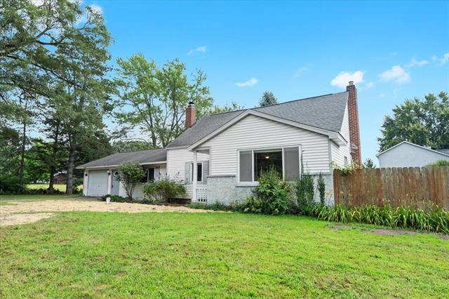 front view picture of 7103 Silver Lake Road, Linden, MI. 48451