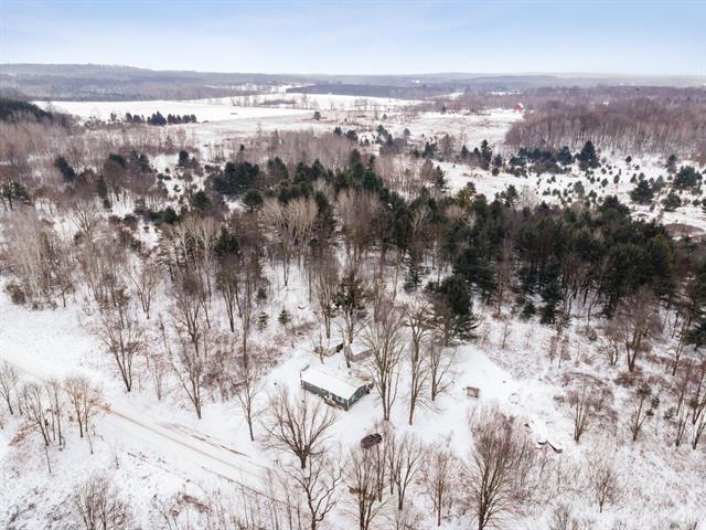 front view picture of 11785 Maple Road, Lake, MI. 48632