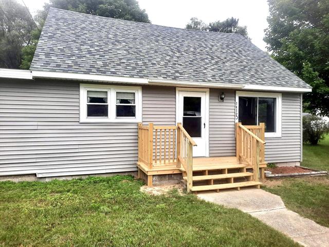 front view picture of 14120 William Street, Rodney, MI. 49342
