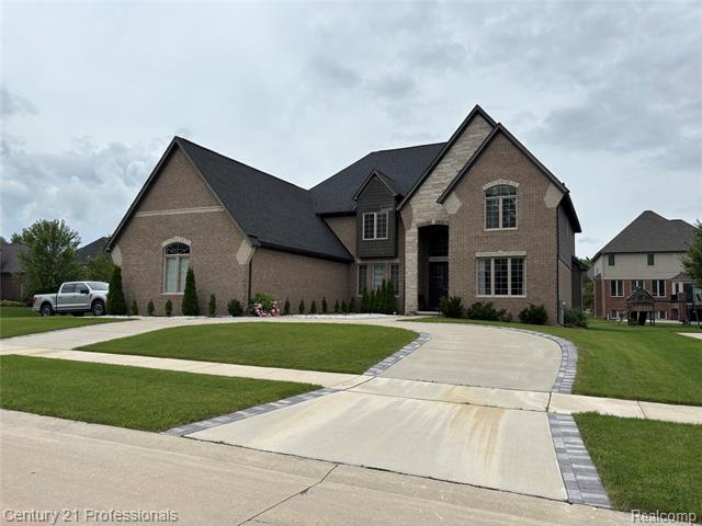 front view picture of 55667 Lochmoor, Shelby Township, MI. 48316