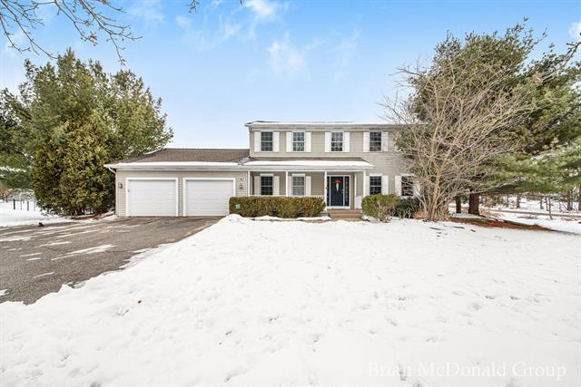 front view picture of 7987 36Thse  Street, Ada, MI. 49301