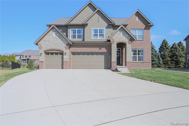 front view picture of 13101 Valencia Drive, Utica, MI. 48315