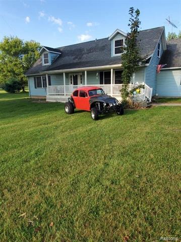 front view picture of 4398 Kensington Road, Milford, MI. 48380
