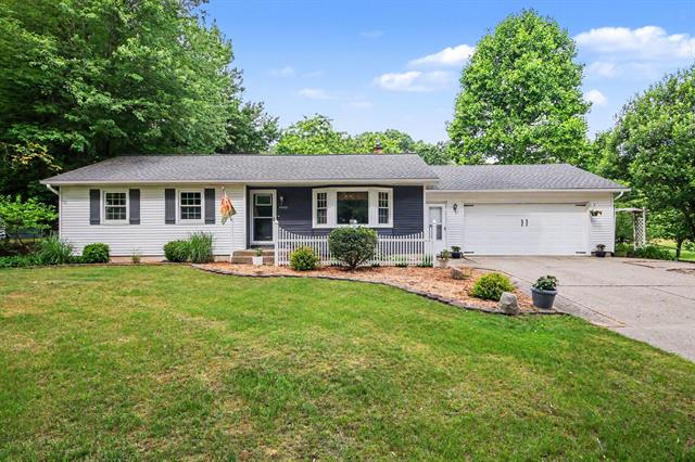 front view picture of 7475 Thornapple River Drive Se, Caledonia, MI. 49316