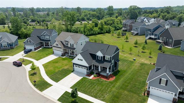 front view picture of 19921 East Breton Court, Chelsea, MI. 48118