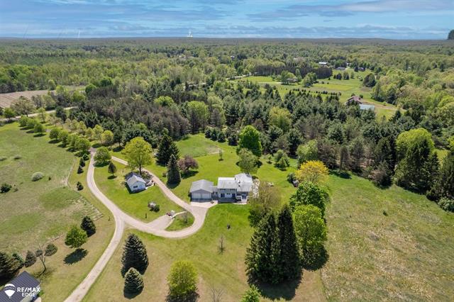 front view picture of 4705 Lonsberry Road, Columbiaville, MI. 48421