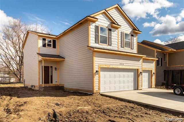 front view picture of 2323 E Maple Road, Troy, MI. 48083
